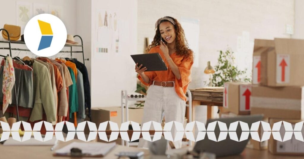lady running an ecommerce business on the phone smiling