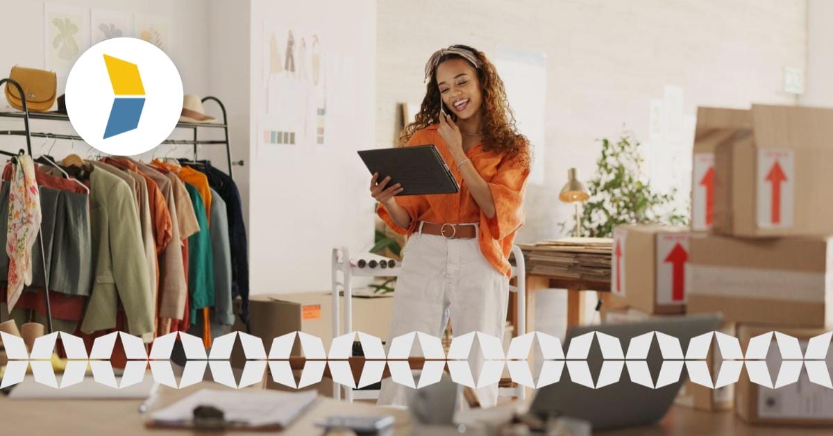 lady running an ecommerce business on the phone smiling